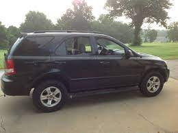 Make Kia Model Sorento Year 2005 Exterior Color Black Interior Color Gray Doors Four Door Vehicle Condi Gasoline Engine Kia Sorento Colorful Interiors