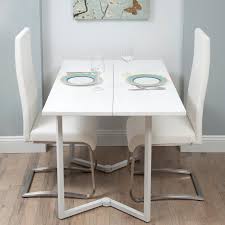 white fold away dining table and chairs
