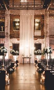 35 Super Stunning Ceremonies That Ll Make You Want To Say I Do Elegant Wedding Venues Aisle Candles Romantic Wedding Receptions