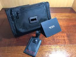 The interior features three zip pockets, all with clear windows so you can see what's inside. Tumi Alpha 2 Travel Kit Men S Fashion Bags Belt Bags Clutches And Pouches On Carousell