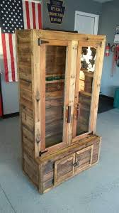 Then there is a small cupboard in the bottom that can be used to store smaller guns or ammo as well. Homemade Gun Cabinet Plans Novocom Top