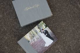 The coffee table book (since 2006) works exclusively with couples across australia crafting modern wedding albums and the popular alternative specialising in beautifully handcrafted wedding photo albums offering couples the opportunity to create a bespoke heirloom quality album full of their. Wedding Albums With Photo Wrap Covers Wedding Photo Albums The Coffee Table Book Wedding Album Design