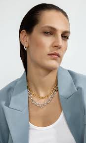 ジョアンフックjoanne hookジグソーパズル_ザ バリアリーフ750ピース  大きな輪が小さな輪を包み込むようにふたつのオーバルが結ばれる「オフスプリング」は、永遠に途切れることのない愛や関わりを表現したコレクションです。