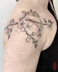 27 Charming Cherry Blossom Tattoo Examples Blossom Tattoo Cherry Blossom Tattoo Blossom Tree Tattoo