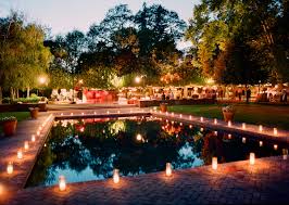 Tap into their creative genius to throw a waterside bash of your own! Candlelight Pool Wedding Photo By Meg Smith Photography Wedding Inspiration Board Junebug Weddings