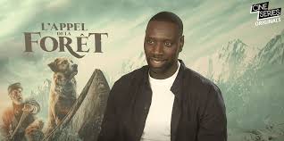 L Appel De La Foret Omar Sy Nous Raconte Son Travail Avec Harrison Ford La Foret Film Harrison Ford Film