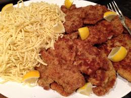 My grandma's authentic german schnitzel makes an easy dinner of pork chops pounded thin then coated with panko bread crumbs and fried crispy golden brown. Pork Schnitzel Kath S Kitchen Sync