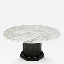 Clad in marble, a tracery of natural veining lends each table unique character, while a low. White Carrara Marble Coffee Table With Ebonized Fluted Wood Base