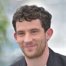Josh O'Connor: Curly Hair With Short Back And Sides