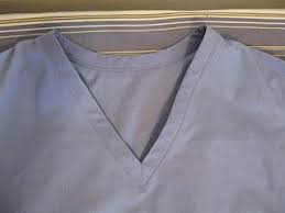 How to sew a woven neck binding in the round step 1: Kadiddlehopper Tutorial Bound Neckline On Scrubs Scrubs Pattern Nursing Scrubs Pattern Scrubs Uniform Pattern