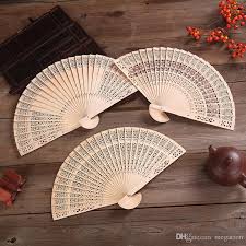 The top countries of suppliers are india, china. Sandalwood Fan Hand Held Folding Fans Chinese Traditional Hollow Fans Wooden Baby Shower Gifts Wedding Favors From Megatron 0 73 Dhgate Com