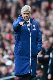 + arsene wenger at emirates stadium (photo credit: Arsene Wenger Coat Where Can I Buy One Is It Available At Arsenal Club Shop And How Much Does It Cost