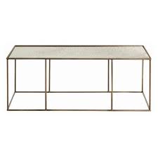 It sold out that day, everywhere, and hasn't been back since. Arteriors Home Othello Brass Coffee Table