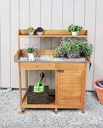 Potting benches are functional pieces of outdoor garden furniture that not only allow you to pot your plants with ease, but offer all sorts of storage for your gardening tools. 20 Best Potting Benches Garden Work Benches With Storage