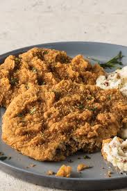 The ultimate chicken fried steak is fried to golden perfection and topped with the creamiest gravy you can imagine, sure to quickly become a family favorite. 8 4 5 Oz Chicken Fried Steaks Chicken Fried Steak Fried Chicken Cooking Dinner