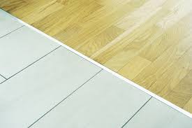 Vinyl flooring can be installed in almost any room, over a lightly textured or porous surface, or over a what should i do before installing vinyl flooring? Flooring Transition Strips From Kitchen To Living Roomlearning Center