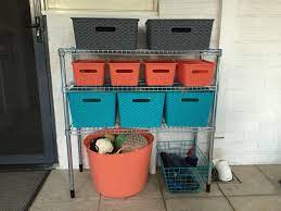 Outdoor Toy Storage Using Ikea Omar Shelf And Baskets Buckets From Kmart Outdoor Toy Storage Toy Storage Patio Organization