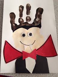 V For Vampire Handprint Art Halloween Crafts For Kids Halloween Crafts Halloween Preschool