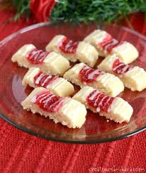 Bake until golden brown, about 20 minutes. Buttery Glazed Raspberry Ribbon Cookies Creations By Kara