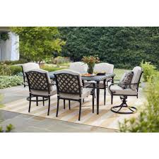 Hampton Bay Laurel Oaks 7 Piece Brown Steel Outdoor Patio Dining Set With Standard Putty Tan Cushions 525 0200 000 The Home Depot Patio Dining Furniture Outdoor Dining Set Outdoor Decor
