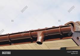 Rooftop runoff should be directed to a. New Rain Gutter Drain Image Photo Free Trial Bigstock