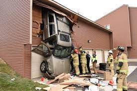 Yuletide townhall parking garage 2nd floor. Man S Car Sails Out Of Second Floor Garage Takes Dive