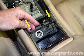 Is there a simple way to get it out without resorting to trying to get a blade under the plastic. Mercedes Benz W203 Lower Center Console Removal 2001 2007 C230 C280 C350 C240 C320 Pelican Parts Diy Maintenance Article