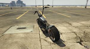 The bike is depicted with a rather long body, featuring a small front mudguard attached to the center of the wheel and telescopic forks, while the upper area features a circular headlight mounted on the lower clamp and two small turn signals. Western Zombie Bobber Von Gta 5 Screenshots Features Und Eine Beschreibung Uber Das Motorrad