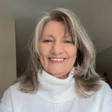 I am squatting next to the pottery headstone of William Reid, brother of my  3rd Great Grandmother Elizabeth Reid Dillard. Elizabeth was married to  Samuel Dillard. The Dillards came from Pacolet, Spartanburg