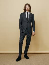 Generally, when you go for chelsea boots in a black or dark brown color, you can easily pair them with most of the suit color choices. Men S Charcoal Suit White Vertical Striped Dress Shirt Black Suede Chelsea Boots Black Knit Tie Lookastic
