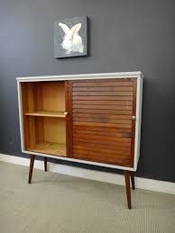 Be sure to check out the written article linked below if you plan on building this yourself. Mid Century Shelf Unit With Sliding Doors Retrocraft Design Collection Sold Items