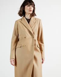 More like little bat wings than long, elegant fins. Double Breasted Peaked Lapel Coat Camel Jackets And Coats Ted Baker Row