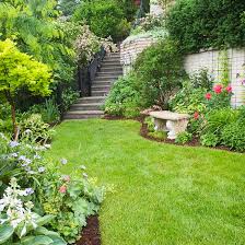 At the top of the hill, near the house, there's two patio seating areas for eating or casual conversation. Hillside Landscaping Ideas Better Homes Gardens