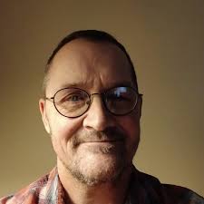 He trusts her completely, that's why he wants a signed document, so  everyone else can trust her too.