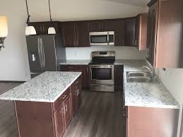 Alder wood cabinets stainless steel appliances and natural. Maple Pecan Cabinets W Formica Tops Traditional Kitchen Other By Kitchen Baths And More Houzz