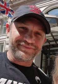 What is the person in the photo thinking about?