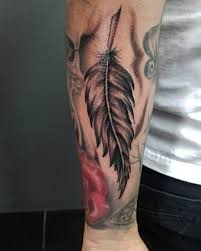 The blend of feather tattoos below does not only look attractive but are placed in such a nice place. 115 Awe Inspiring Feather Tattoo Ideas For Tattoo Lovers