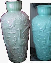 Peacock vases use beautiful striations and colorful accents to mimic the patterning of a peacock feather. Antique Gillinder Puffy Glass Peacock Vase Collectors Weekly