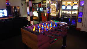 Glowing Foosball Table Basement Arcade And Video Game Room Game Room Decor Arcade Game Room Video Game Room