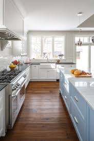 As representatives of well established and reputable canadian cabinets manufacturers since 1987, kitchen interiors is committed and proud to deliver a quality custom kitchen cabinets in ottawa that reflects canada's leading technology and standards. Tradtioanal White Kitchen Design Calacatta Marble Countertop Light Blue Island Design Astro Desig Tuscan Kitchen Tuscan Kitchen Design Modern Kitchen Flooring