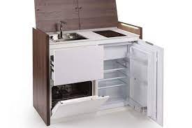 You want complete compact kitchen unit. Compact All In One Kitchen Unit Hides Stove Fridge And Dishwasher Video