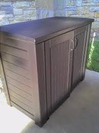 Rubbermaid Bridgeport 123 Gal Resin Patio Cabinet 1863391 The Home Depot Patio Storage Patio Cabinet Trash Can Storage Outdoor