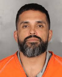 Man charged with bizarre threats in parking lot