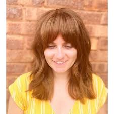 This hairstyle is relaxed without being sloppy. 100 Medium Length Hairstyles Hairstyle Secrets Hairstyle Secrets