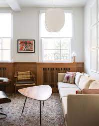 Probably one of the most important things in this decor style is wood. 5 Tricks For A Home That Feels Homey Inspired By This Midcentury Modern Nyc Apartment Modern Apartment Design Modern Apartment Living Room Mid Century Modern Interiors