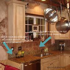 Brown kitchen tile backsplash for warmth How To Work With Your Existing Granite When Updating Your Kitchen Bella Tucker