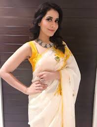 She began her vocation with the hindi film madras cafe as an actress and made her telugu debut with the film oohalu gusagusalade (2014), with the. Tollywood Actress Rashi Khanna In Transparent Sleeveless White Saree Rashi Khanna