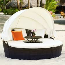 Upscale outdoor cabana crafted of eucalyptus frame and acrylic upholstery includes canopy, cushions, and curtain. Round Outdoor Daybed Replacement Canopy