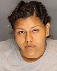 Police arrest woman in July 18 homicide