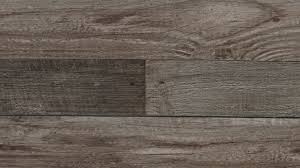 Coretec flush mount stair nose. Fallen Oak